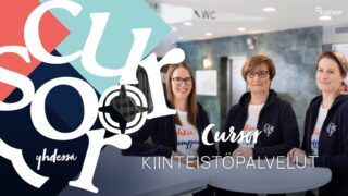 Cursorin kiinteistöpalveluiden henkilökunta katsomassa kameraan päin.